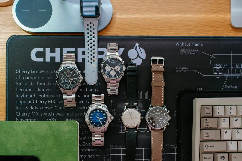 Swatchos color swatch cards with CMYK and RGB hex values showing being used by a graphic designer on a graphic designers desk